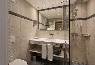 Badezimmer Sunstar Hotel Arosa Schweiz